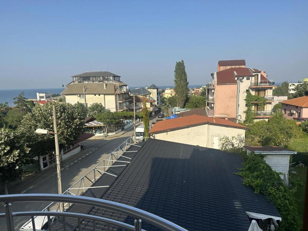 a view of a parking lot from a roof at Guest House Karavida in Sinemorets