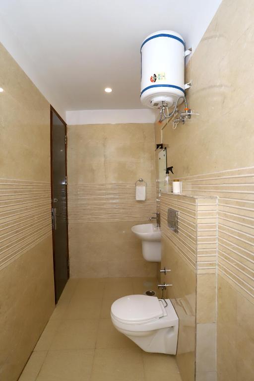 Koupelna v ubytování VRINDAVAN GUEST HOUSE