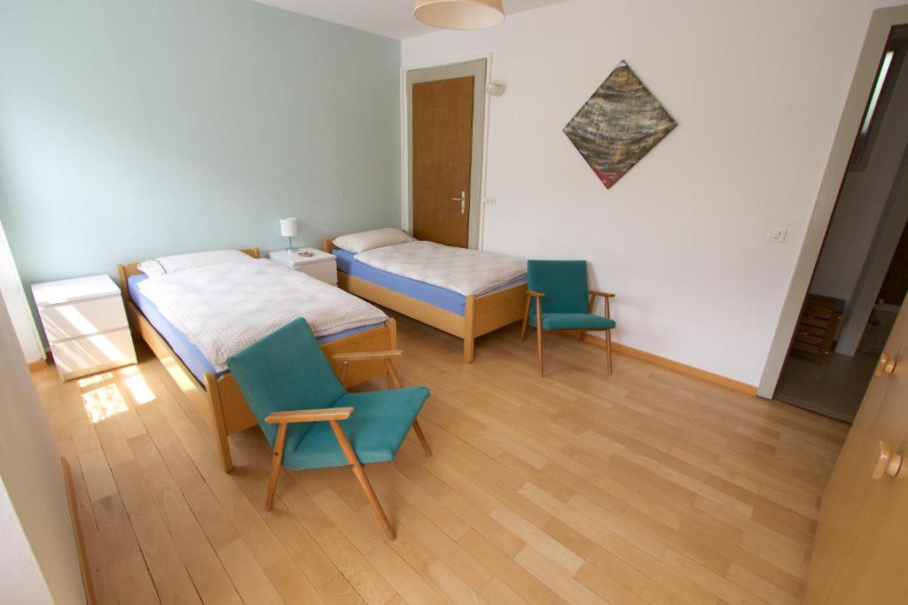 Postel nebo postele na pokoji v ubytování Chalet Cuore delle Alpi