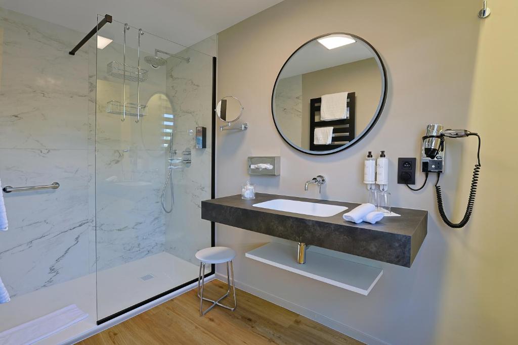 Koupelna v ubytování Hotel Quartier Latin