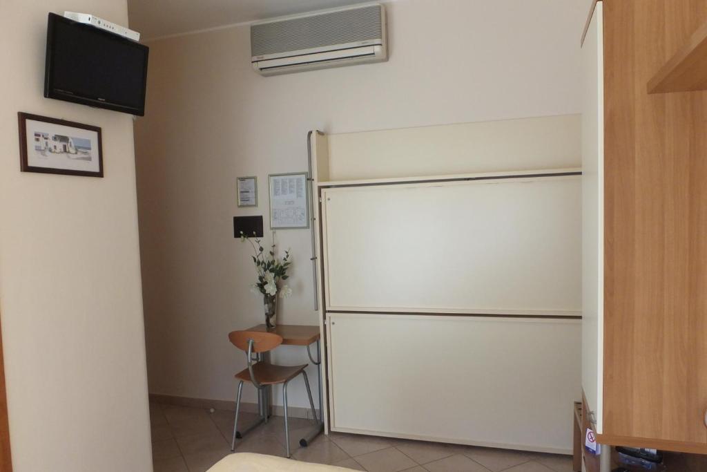 TV a/nebo společenská místnost v ubytování Hotel Nettuno