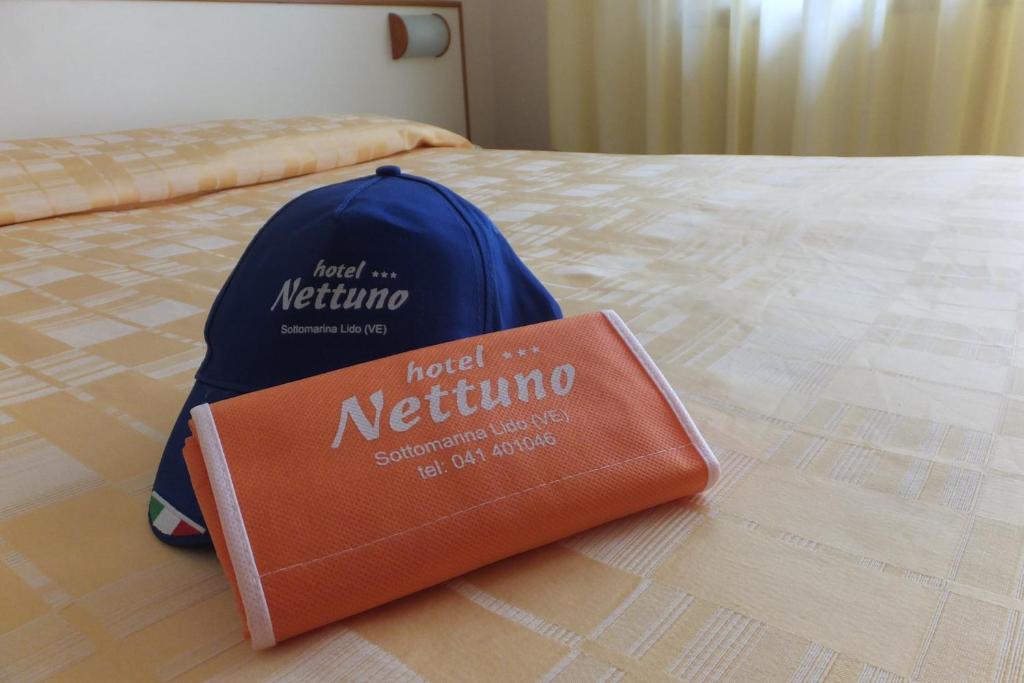 Postel nebo postele na pokoji v ubytování Hotel Nettuno