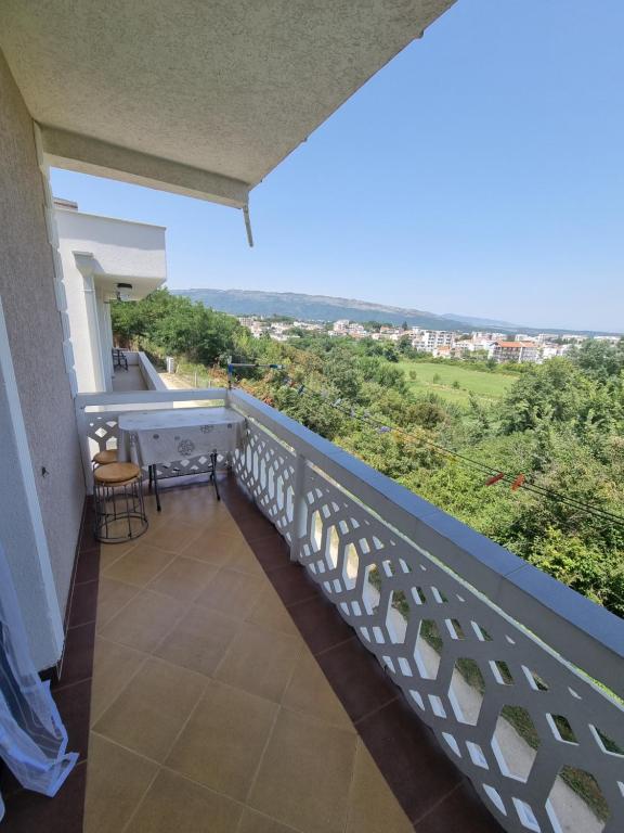 a balcony with a view of the countryside at Becic Apartments in Ulcinj
