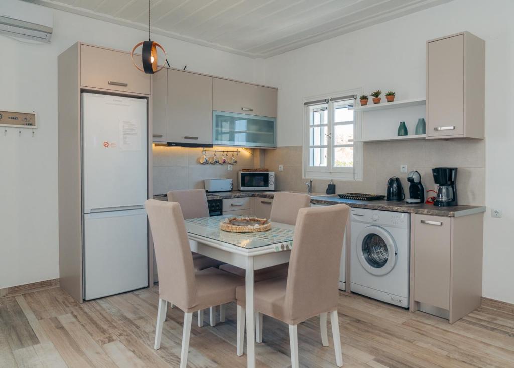 A kitchen or kitchenette at Erifili Houses