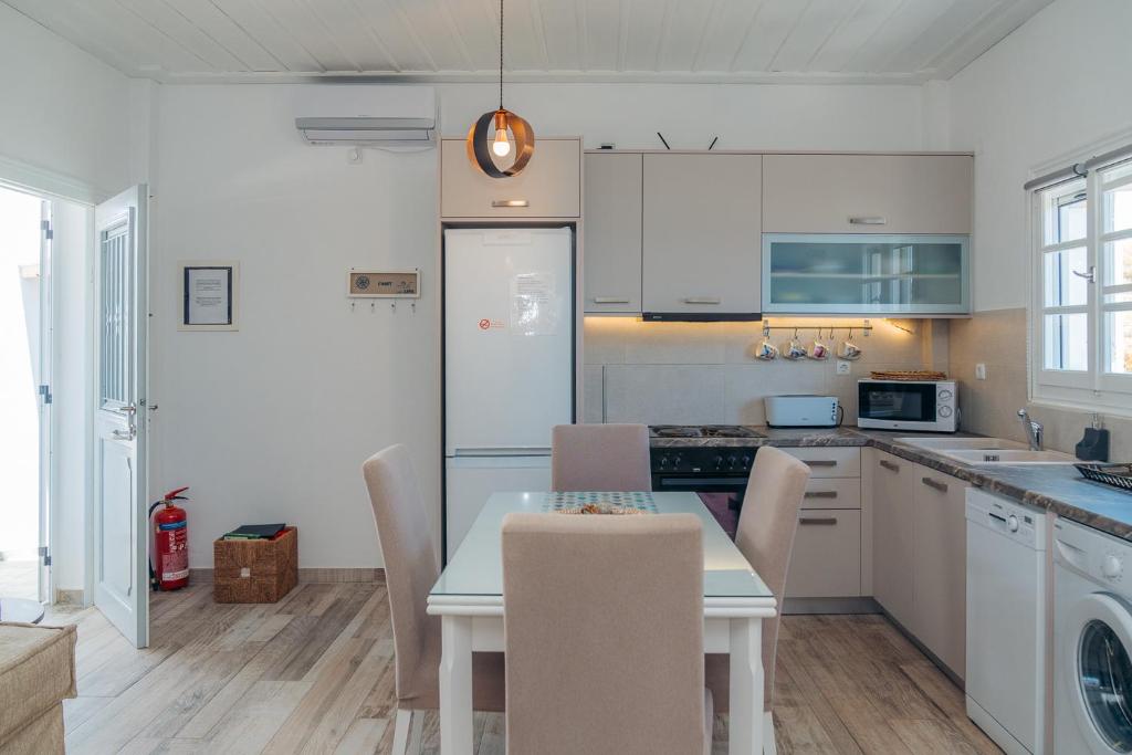A kitchen or kitchenette at Erifili Houses