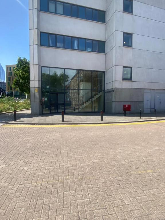 a large office building with a large window at St James’ Blvd Newcastle Apartment in Newcastle upon Tyne