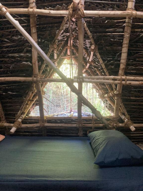 Postel nebo postele na pokoji v ubytování Nebula Nest Cafe & Hostel