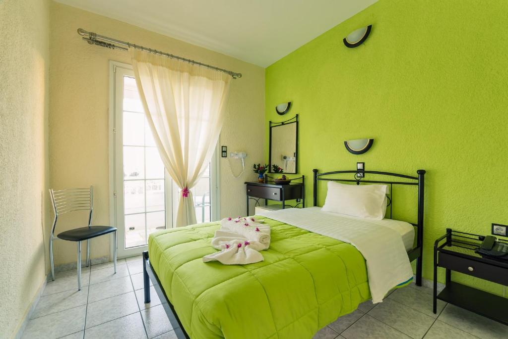 Postel nebo postele na pokoji v ubytování Evelin hotel