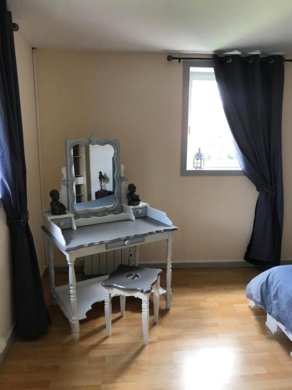 Postel nebo postele na pokoji v ubytování Chambre d'hôtes "COQUELICOT"