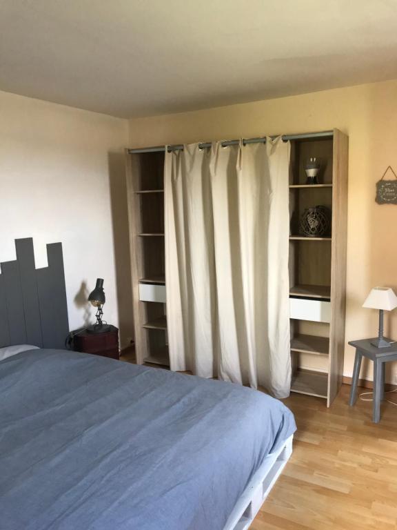Postel nebo postele na pokoji v ubytování Chambre d'hôtes "COQUELICOT"