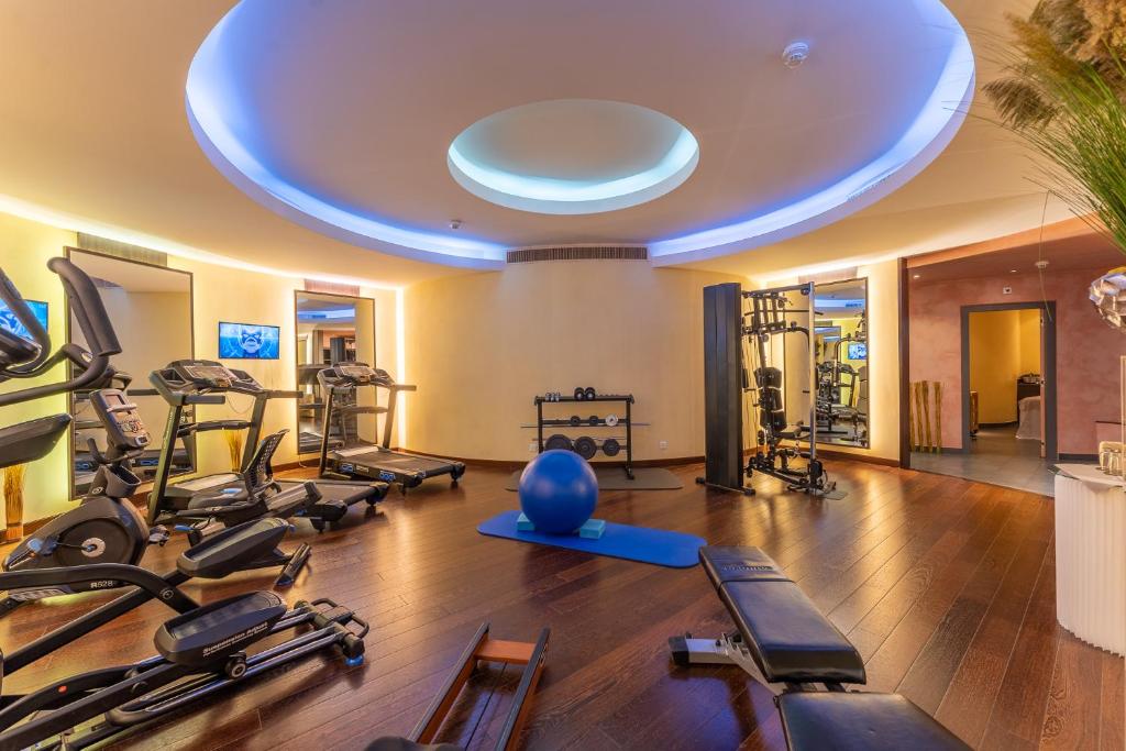 Das Fitnesscenter und/oder die Fitnesseinrichtungen in der Unterkunft Beau Rivage Hotel