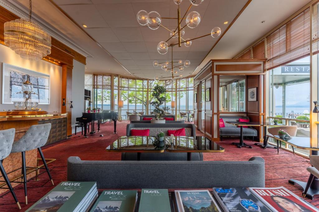 Ein Sitzbereich in der Unterkunft Beau Rivage Hotel