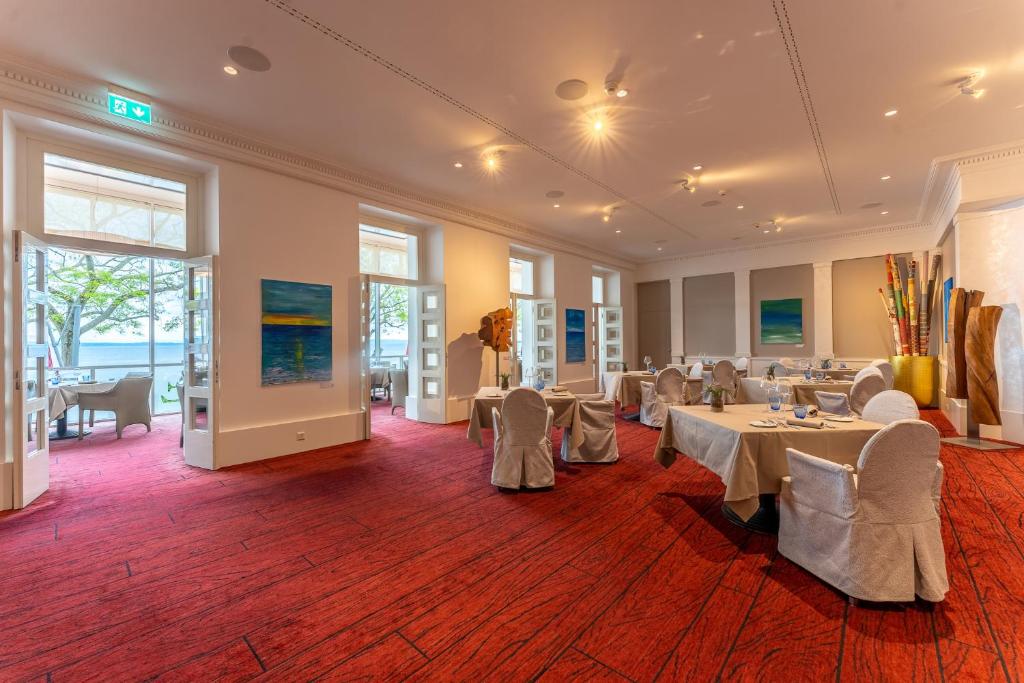 Ein Sitzbereich in der Unterkunft Beau Rivage Hotel