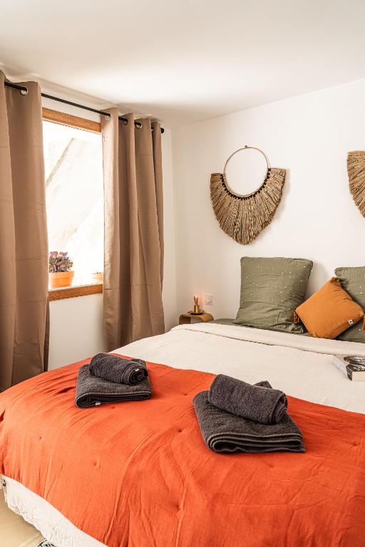 Postel nebo postele na pokoji v ubytování Maison Arthur