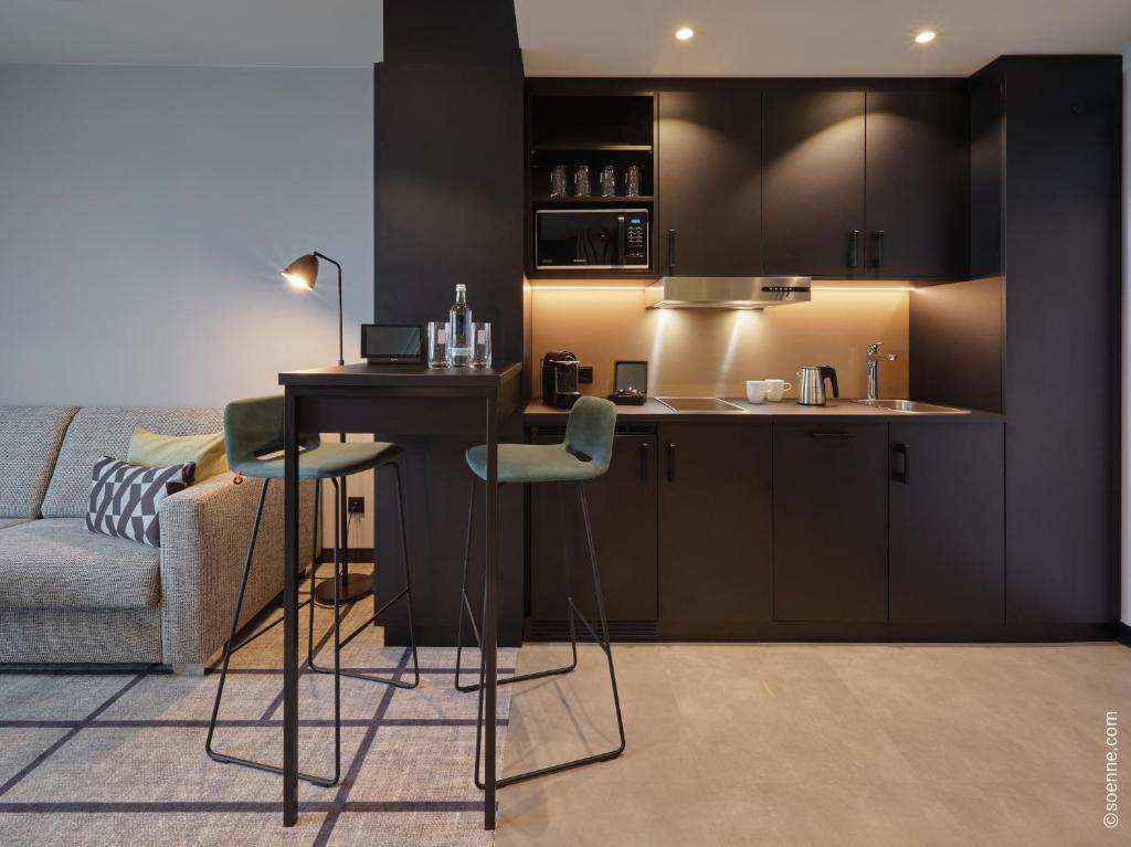 Kuchyň nebo kuchyňský kout v ubytování Dorint Hotel München/Garching