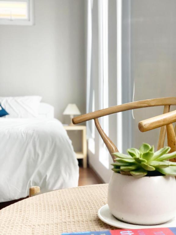 Giường trong phòng chung tại Nai Homestay