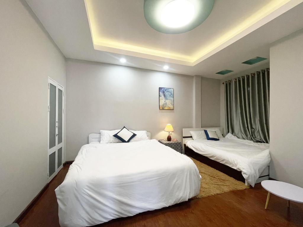 Giường trong phòng chung tại Nai Homestay