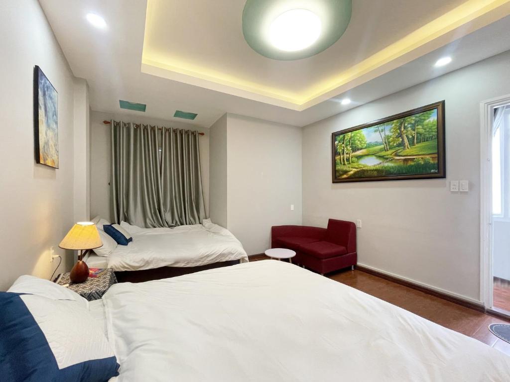 Giường trong phòng chung tại Nai Homestay