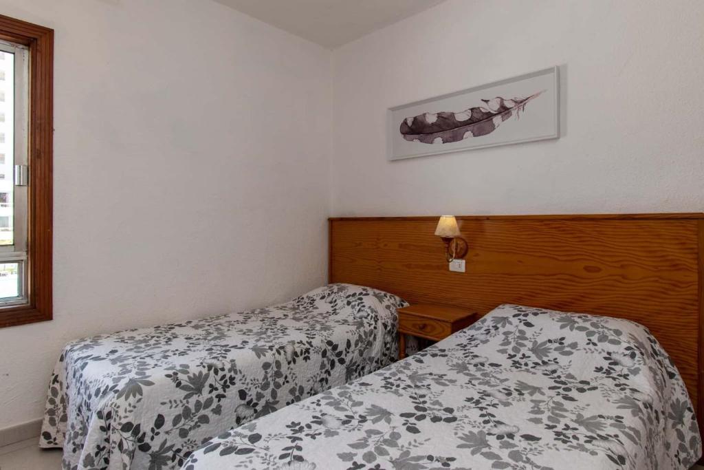Postel nebo postele na pokoji v ubytování Las Blanquitas 5