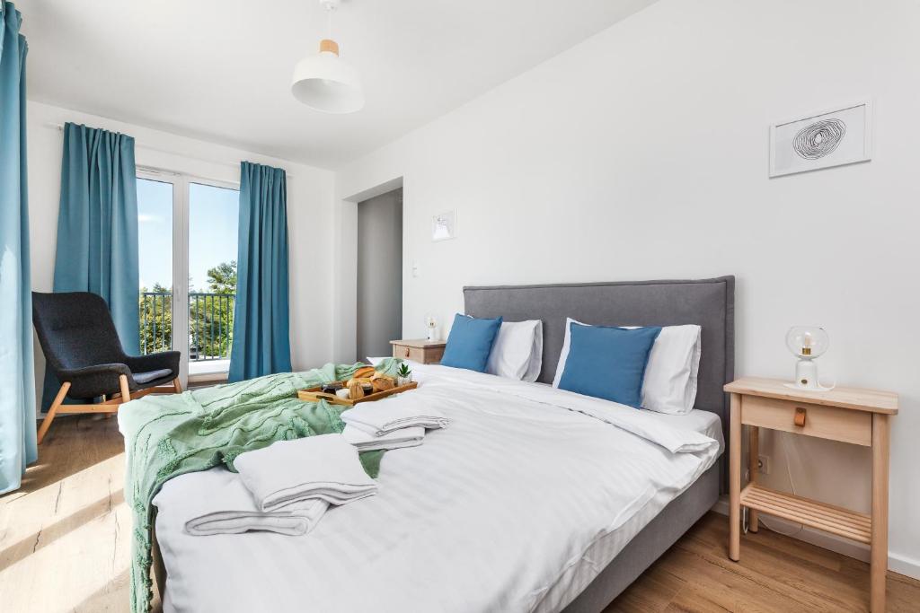 Postel nebo postele na pokoji v ubytování Apartamenty Pilice