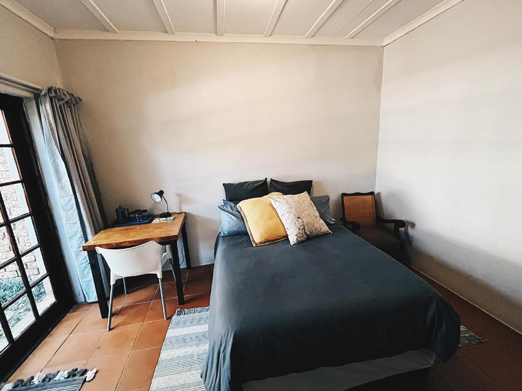 Кровать или кровати в номере Casa Bravo - Pilgrims Palace