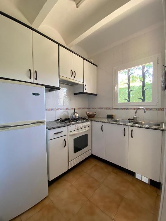 Kuchyň nebo kuchyňský kout v ubytování Apartaments Margarita Sabina Pinell
