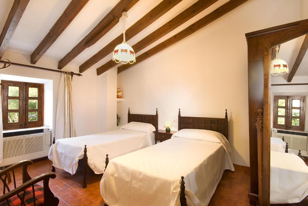 Postel nebo postele na pokoji v ubytování Villa Boquer Petit - Piedra