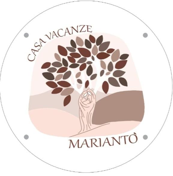 a logo of a tree with the wordsarmaarma marmite at Casa Vacanze Mariantò in Noci