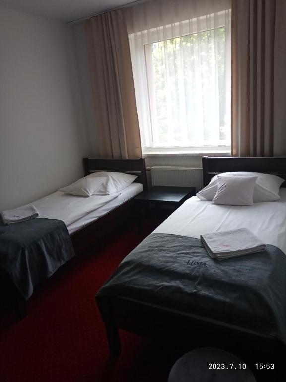 Postel nebo postele na pokoji v ubytování Lusia
