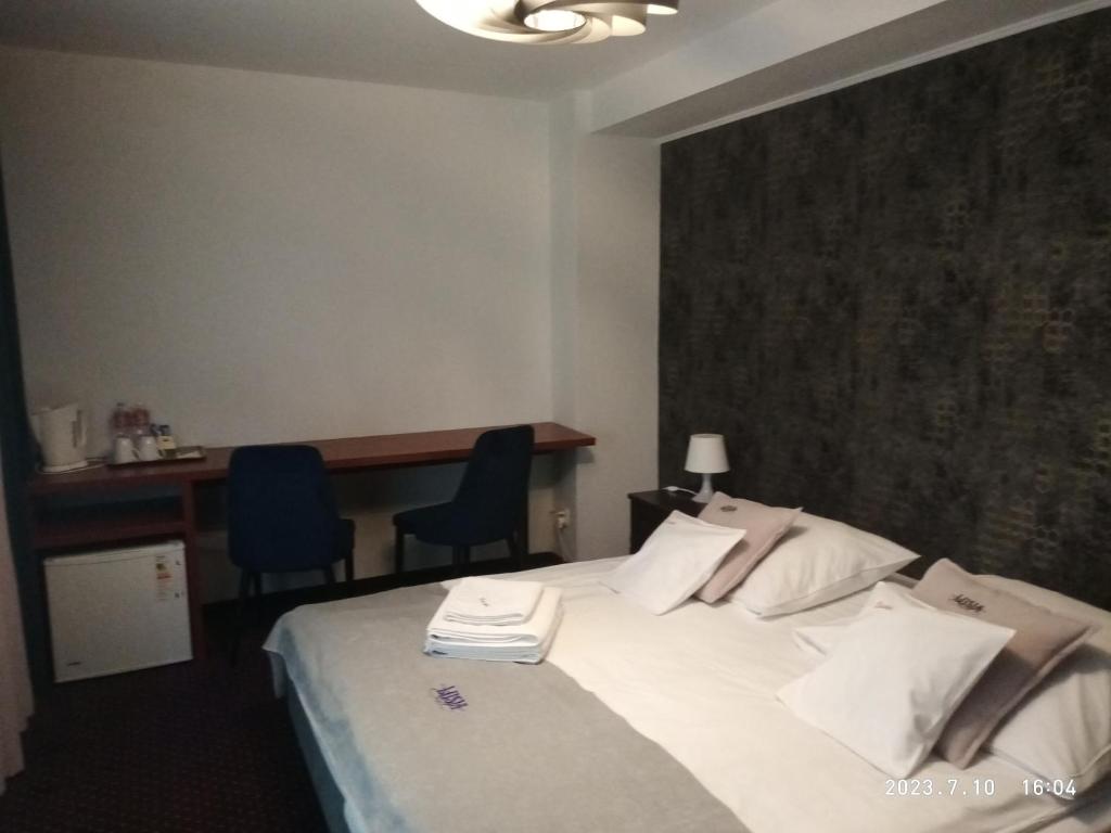 Postel nebo postele na pokoji v ubytování Lusia