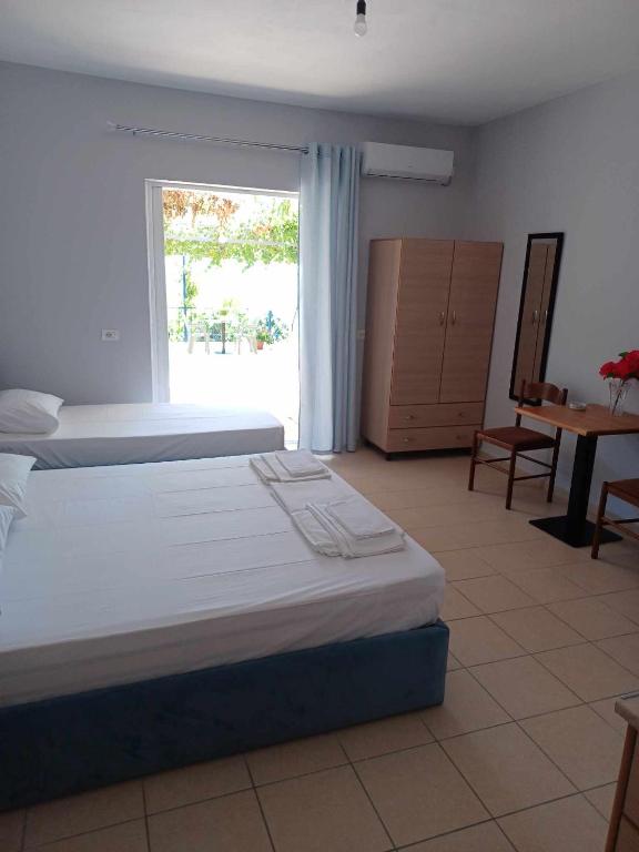 Postel nebo postele na pokoji v ubytování Ionian View Guest House