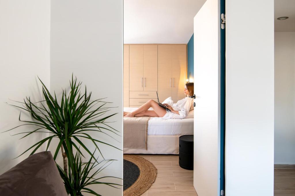 Postel nebo postele na pokoji v ubytování fragoseco loft! Elegance & Luxury