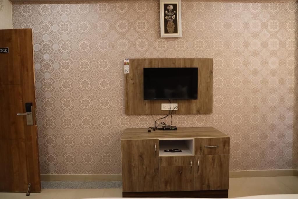 TV a/nebo společenská místnost v ubytování THE JAMAWAR