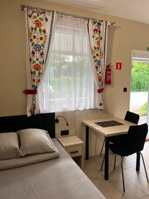 Postel nebo postele na pokoji v ubytování Cicha Dolina