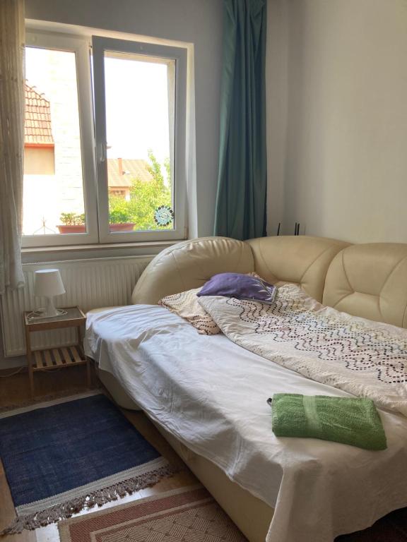 Postel nebo postele na pokoji v ubytování Apartman-Donau Tát