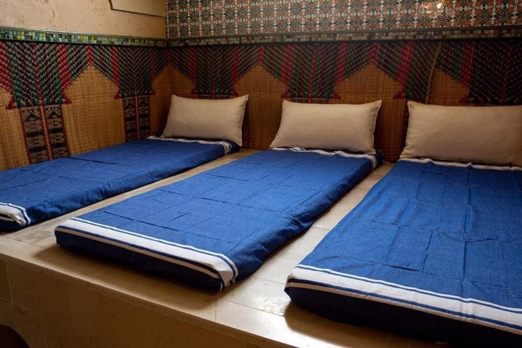 Postel nebo postele na pokoji v ubytování DAR BELDI
