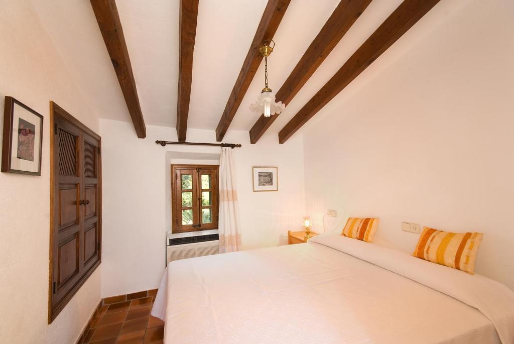 Postel nebo postele na pokoji v ubytování Villa Boquer Petit - Piedra