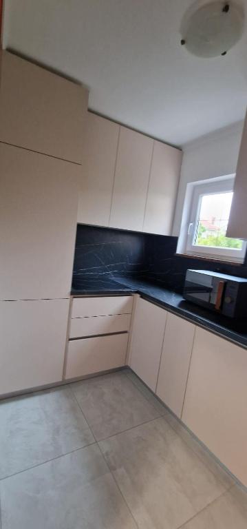 Kuchyňa alebo kuchynka v ubytovaní Apartments Stengl