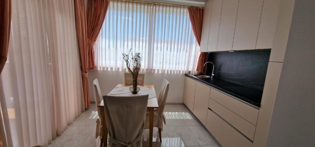 Televízia a/alebo spoločenská miestnosť v ubytovaní Apartments Stengl