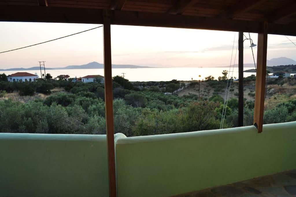 a view of the ocean from a house balcony at Marathias sea view in Lákhion
