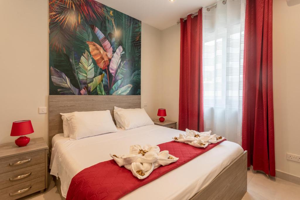 Postel nebo postele na pokoji v ubytování Red Rose