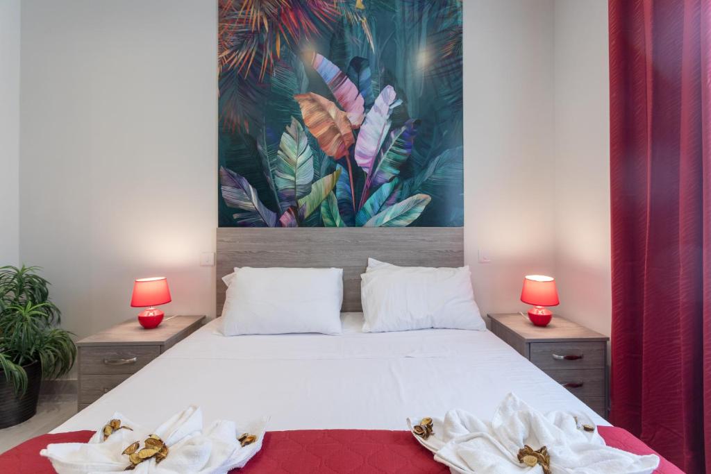 Postel nebo postele na pokoji v ubytování Red Rose