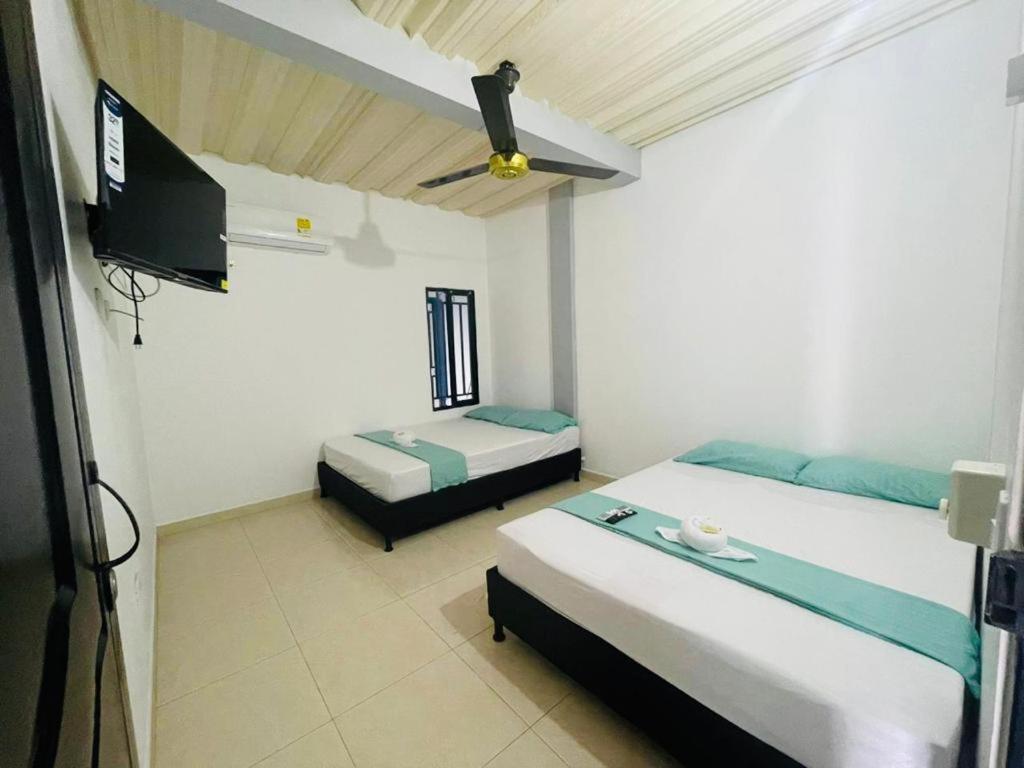 Postel nebo postele na pokoji v ubytování APARTAMENTO vista VERDE DORADAL