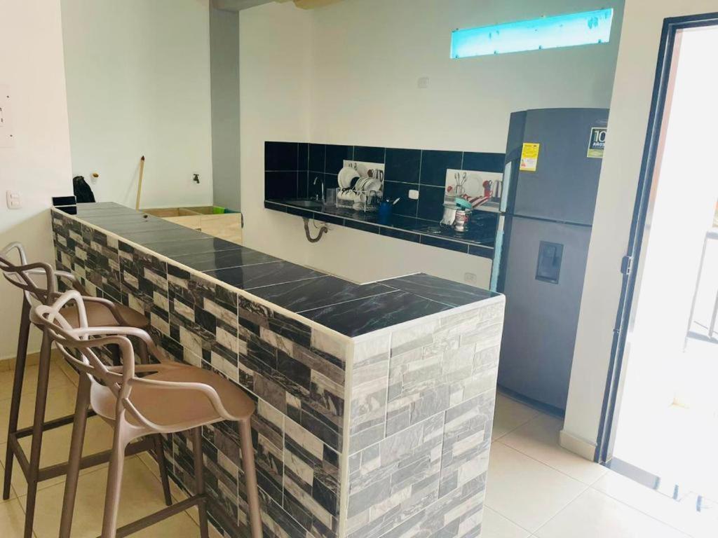 Kuchyň nebo kuchyňský kout v ubytování APARTAMENTO vista VERDE DORADAL
