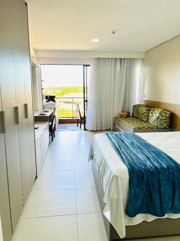 Katil atau katil-katil dalam bilik di Flat completo no Eco Resort na Praia dos Carneiros