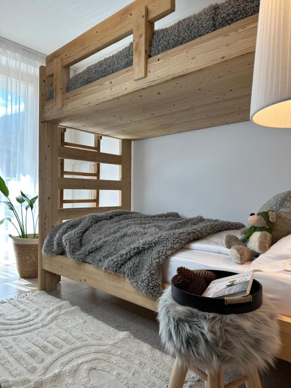 Postel nebo postele na pokoji v ubytování Si Mezzana Home