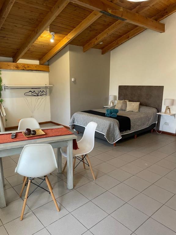 En eller flere senge i et værelse på Loft en zona centrica gastronómica D9