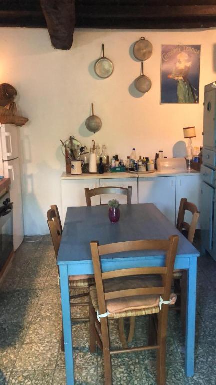 Posedenie v ubytovaní Antica casa colonica in pietra in Toscana