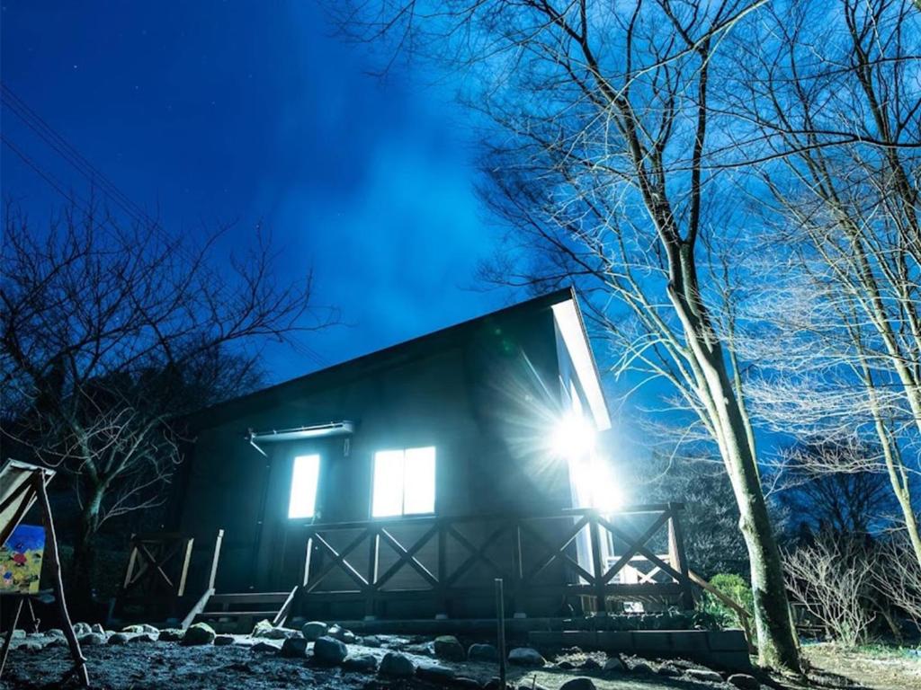 a house with a light on the side of it at night at Guest house KURIHAI - Vacation STAY 09979v in Oita