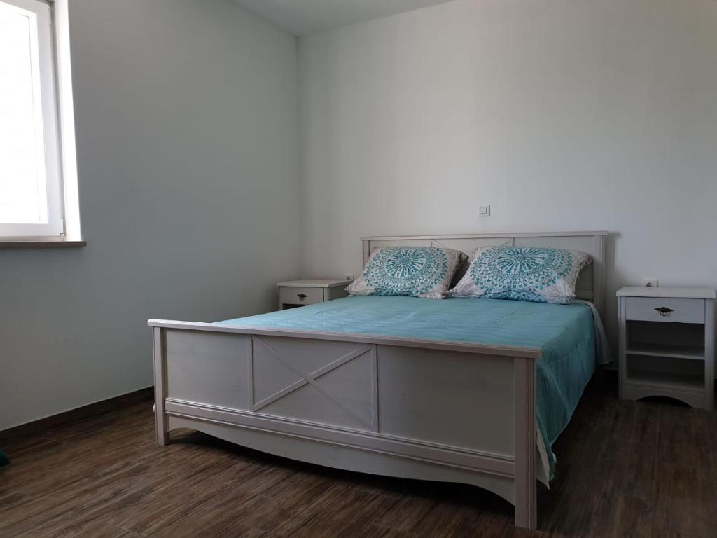 Postel nebo postele na pokoji v ubytování Apartmani Zen